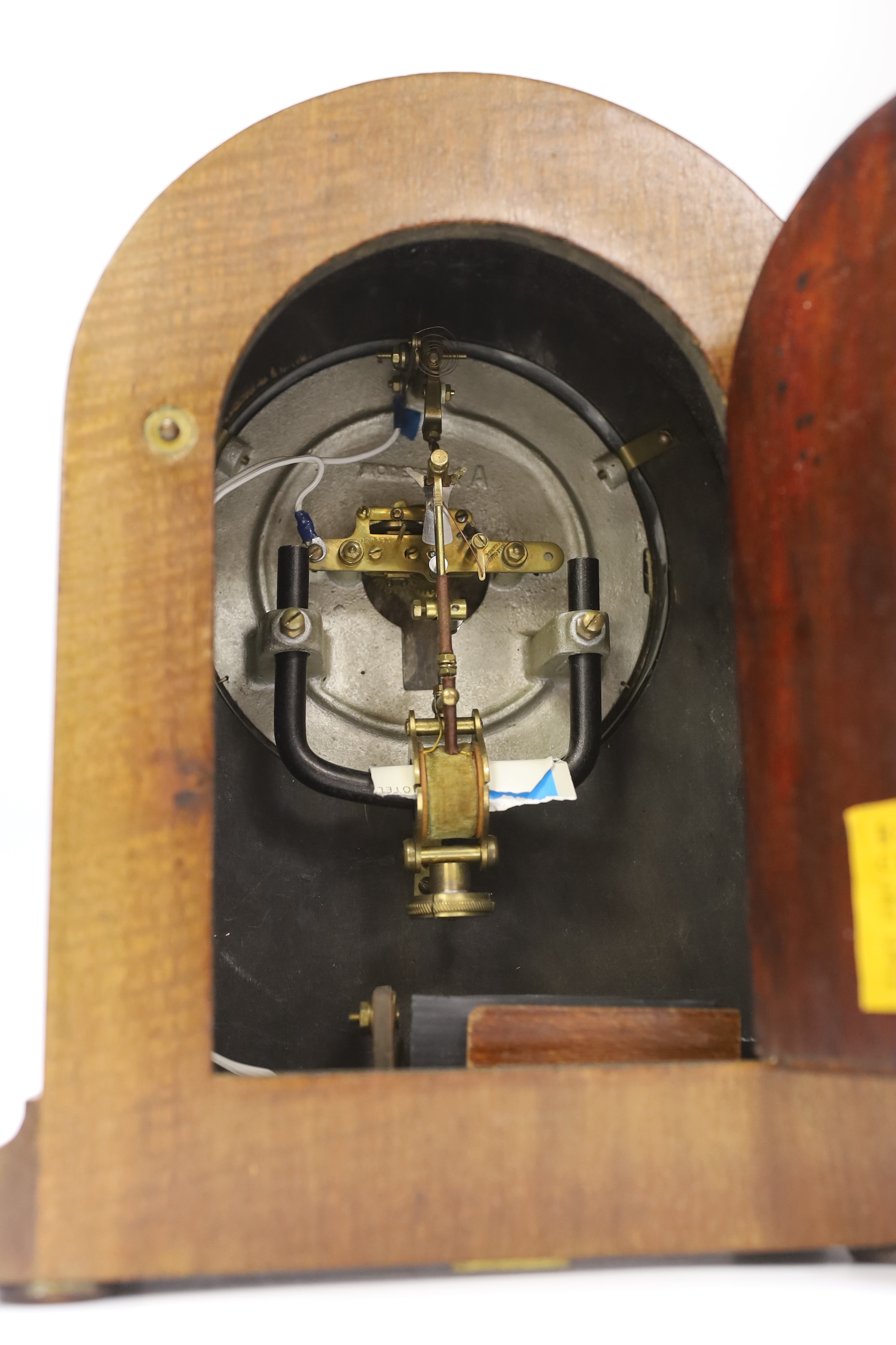 A mahogany Bulle-clock electric mantel timepiece, 30cm